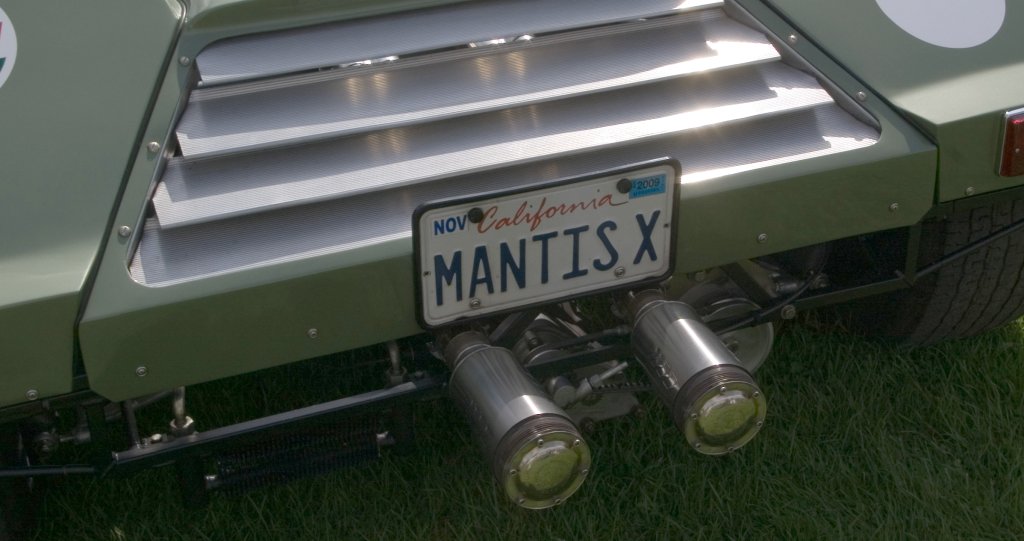 Rear end showing geabox driven alternator - Note new Registration